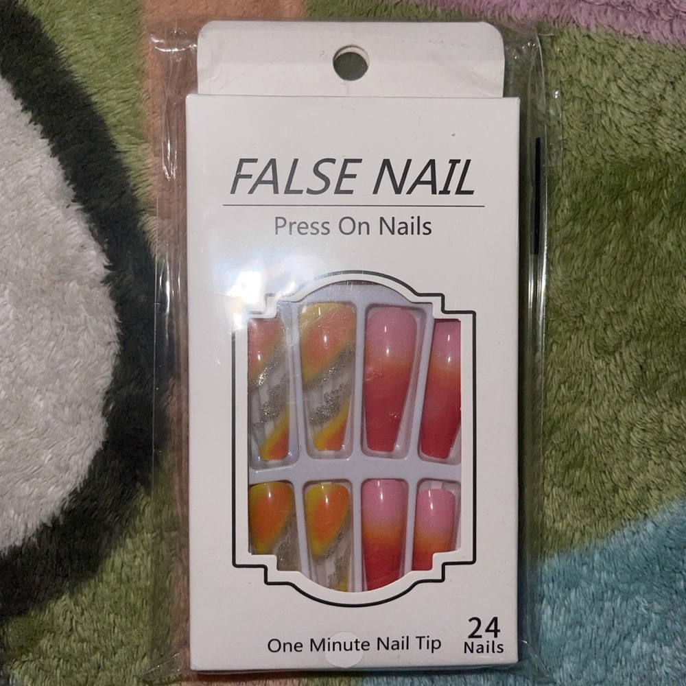 Brand new press on nails (nail file & glue strips included).
